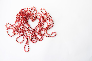 Valentine's day with heart bead on white background and place for signature
