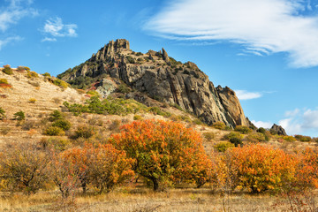 Rocks of the extinct volcano KaraDag in autumn