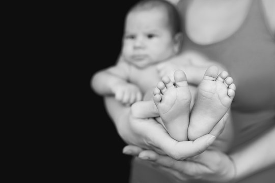 black and white photo of newborn baby