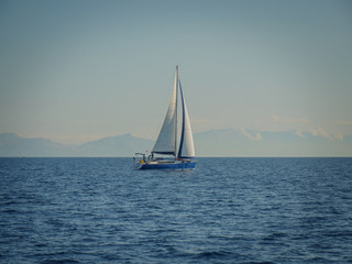 CROATIA, ADRIATIC SEA, 2017.11.07: Sailing boat in front of islands.