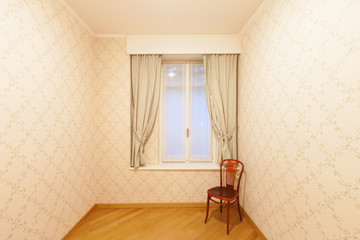 Room with upholstery on the walls
