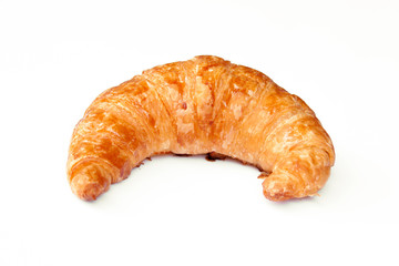 freshly baked croissants on white background, top view