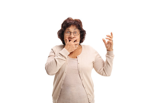 Surprised Senior Lady Covering Her Mouth With Her Hand