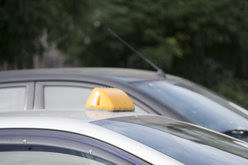 Taxi car on the street at night