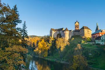 Admiring the sunset colors at  the 12th Century Gothic Castle surrounded by the Ohre River, Loket...