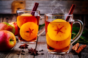 homemade hot mulled apple cider with a cinnamon stick