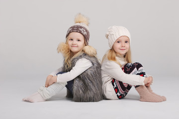 two beautiful girls on white background