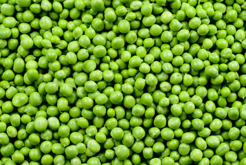 Green Peas. Green background. Peas background. Top view.