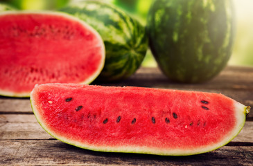 Sliced watermelon on brown table