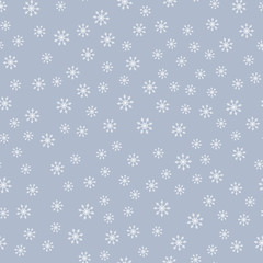Simple seamless pattern with snowflakes.