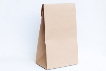 Empty paper bag brown color  blank screen on white background