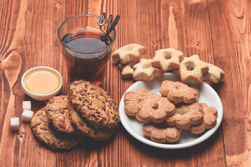 Hot beverage and pastry concept. Glass of black tea