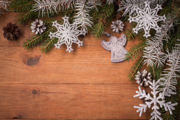 brown wooden background with Christmas decorations, Christmas tree and angel
