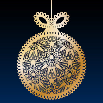 Decorative golden lace Christmas ball toy on dark blue background