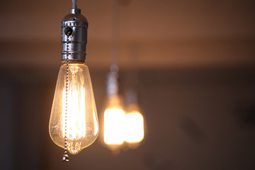 Lamps with tungsten filament. Edison's light bulb. Filament fila