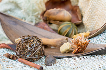 Christmas spices on a background of natural fabric. Cinnamon sticks and anice. selected focus
