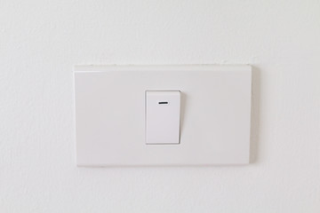 Electronic switches with white background, White switches on wall in home, Closeup switches...
