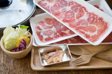 Sliced pork and vegetables in hot pot