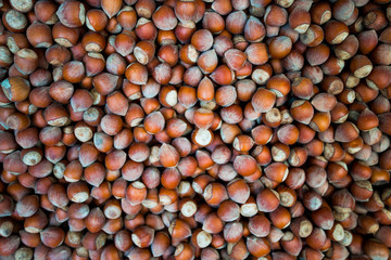 Hazelnuts. Food background. Stack of hazelnuts. Hazelnut background