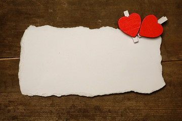 white sheet paper love notes and heart shape