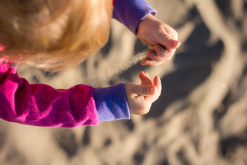 kid loving the beach
