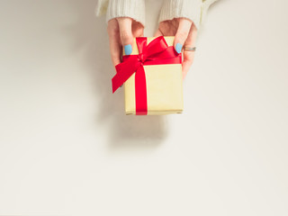 celebration idea for christmas and new year event by beauty woman hand hold the gift box for offer to her respect person with isolated white background