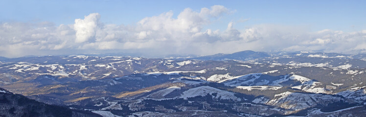 Fototapeta na wymiar Carpathian mountain landscape. Panorama of Snow Mountain.
