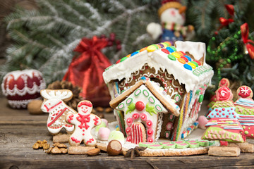 Gingerbread house. Christmas holiday sweets. European Christmas holiday traditions. Christmas gingerbread house and holiday decorations.