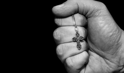 Hand with a cross