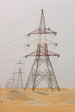 Electricity pylons in dessert, Abu Dhabi, United Arab Emirates