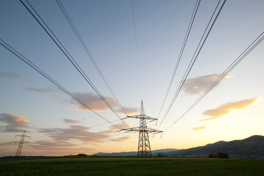 Electricity pylons in fields, Hartberg, Styria, Austria