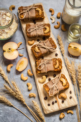 Homemade granola with oatmeal, nuts, dried apricots, dried fruit and chocolate