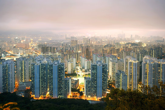 Illuminated city at dusk, Hong Kong, China