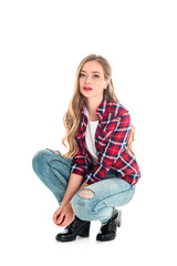 girl in checkered shirt and jeans