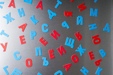 Russian alphabet on a metal surface