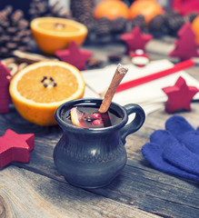 mulled wine in a brown ceramic cup