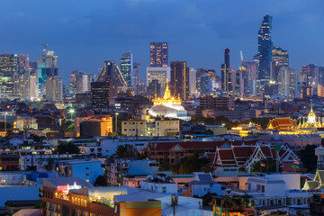 Fototapeta na wymiar Bangkok city skyline with Wat Saket at night.