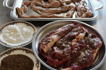 Ready your ingredients-meat, horse meat,gut,salt,cumin for cooking sausages-Kazy.Uzbek cuisine.
