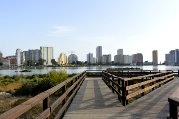 A view on Calpe city and salt lake with flamingos from view point las salinas