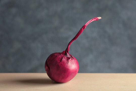 Red onion on blurred background