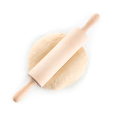 Raw dough with rolling pin on white background