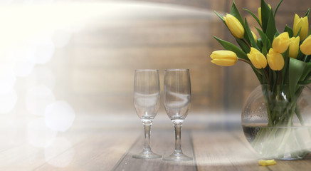  bouquet of yellow tulips in a vase on the floor