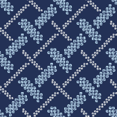 Shibori ornament. Weaving motif. Asian seamless pattern. Dark indigo background. Classic japanese dyeing technique. For wallpaper, web page background, surface textures.