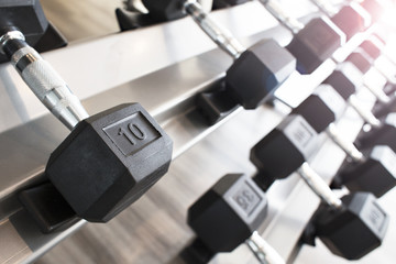 Sports dumbbells in modern sports club for a exercise in the fitness center in gym,Weight Training Equipment