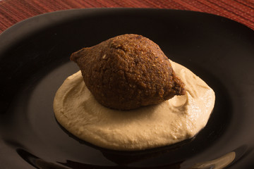 Kibbeh or Kibe, Quibe with Hummus.