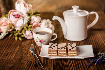 Obraz na płótnie Canvas afternoon tea with sweet cake 