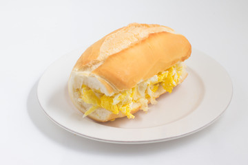 Bread with scrambled egg. Brazilian Pao com ovo