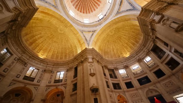 A low angle rotating shot of the interior of the National Pantheon - Panteao Nacional - in Lisbon, Portugal. The monument is also known as Igreja de Santa Engracia Church.