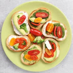 Colorful vegetarian sandwiches on a plate. Healthy food.