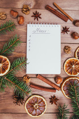 Christmas cookies, spices and recipe book. Food background. Vintage style picture